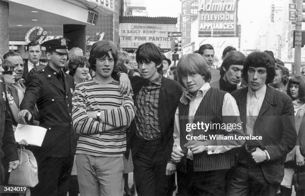 From left to right; Mick Jagger, Keith Richards, Brian Jones , Charlie Watts and Bill Wyman of the Rolling Stones pose for a photo in a New York...