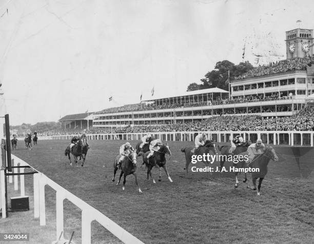 The finish of the Queen Anne Stakes at Royal Ascot, won by Manny Mercer on Argur from J Lindley on Kng's Mistake and W Carr on Tip The Bottle.