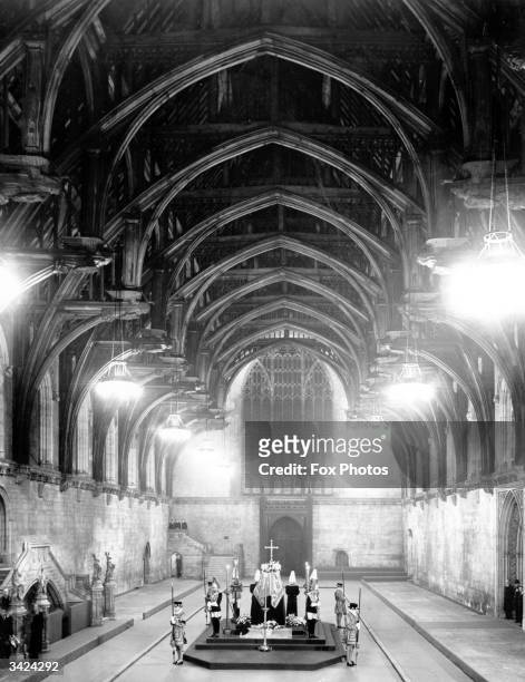 King George VI lying in state in Westminster Hall, London.