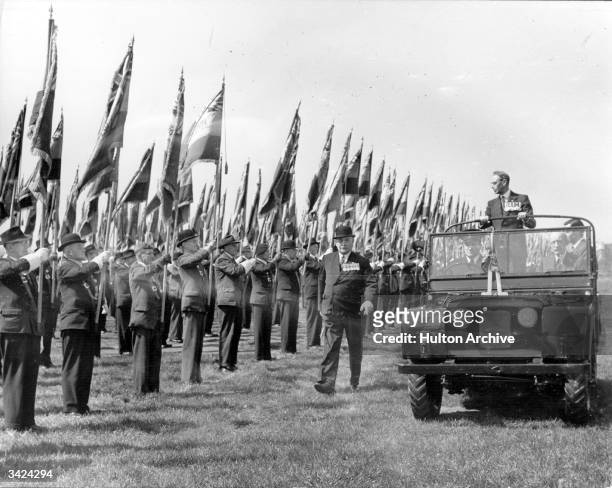 King George VI reviewing the British Legion in Hyde Park, London.