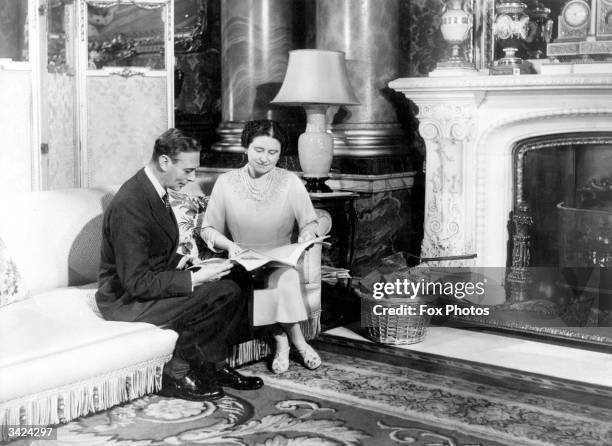 King George VI with Queen Elizabeth at Buckingham Palace.