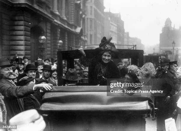 The English suffragette Emmeline Pankhurst , founder with her daughter Christabel of the Women's Social and Political Union, leaves Bow Street police...