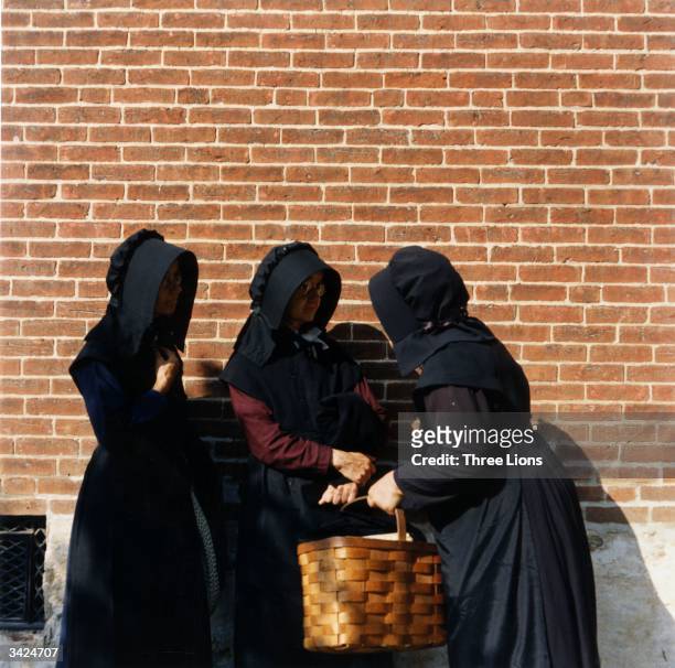 Married women among the Amish wear black bonnets and black or dark coloured full-length dresses, almost girded by black aprons. The Amish have...