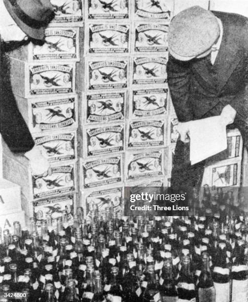 Nazi agents discover a hoard of wine and matches, hidden by a Dutchman after the German occupation of Holland.