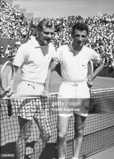 Robert Haillet of France and Lennart Bergelin of Sweden before their Davis Cup match at the Roland Garros Stadium, Paris.