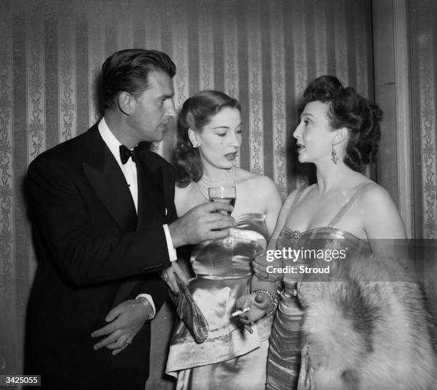 British actors Stewart Granger and Valerie Hobson at a dance. Valerie Hobson later married the Conservative politician John Profumo, whose career...