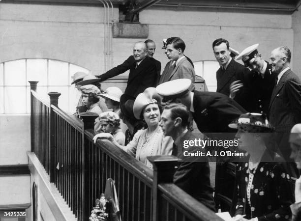 Princess Elizabeth , with King George VI , Lord Louis Mountbatten and Queen Elizabeth, the Queen Mother during a visit to the chapel at the Royal...