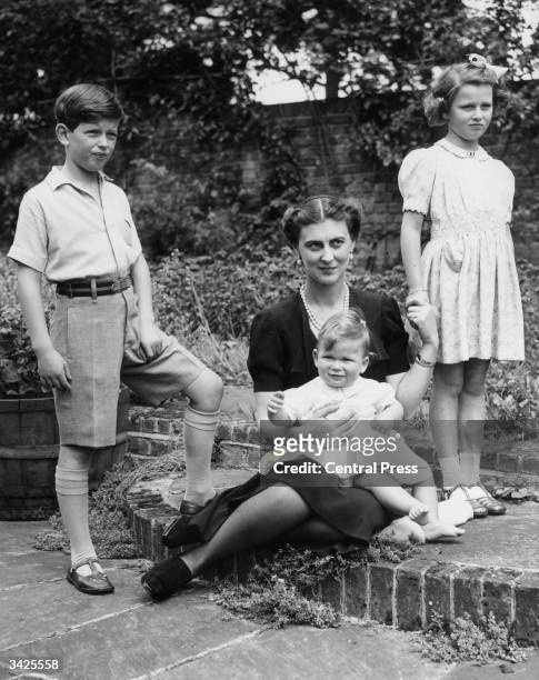 Marina, Duchess of Kent with her three children, Prince Edward , Princess Alexandra and Prince Michael on his first birthday, at Coppin's Ivor,...
