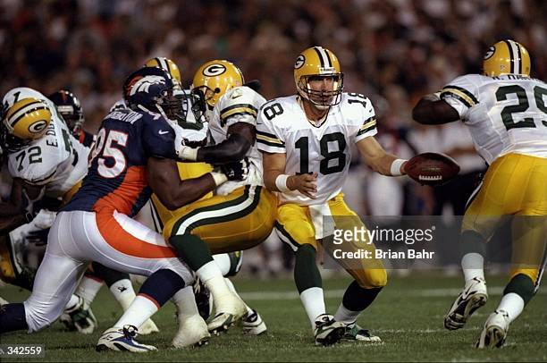 Quarterback Doug Pederson of the Green Bay Packers in action during the pre-season game against the Denver Broncos at the Mile High Stadium in...