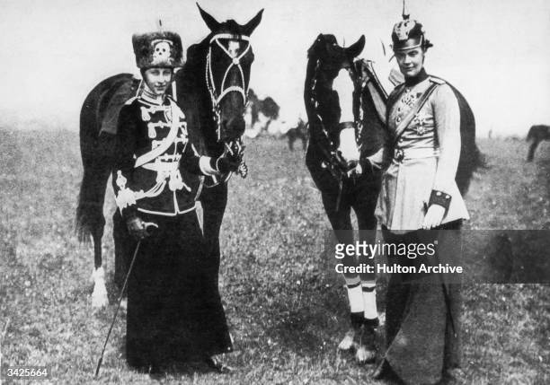 Cecilie, the German Crown Princess , dressed in the uniform of a Dragoon with Princess Victoria Louise , the only daughter of Kaiser Wilhelm II,...