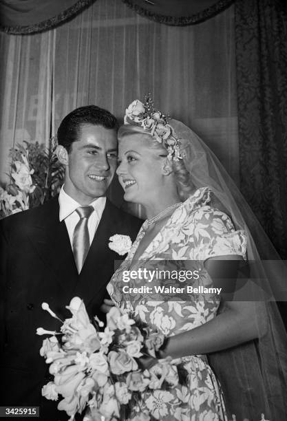 British actress Angela Lansbury and her husband, Peter Shaw, at their wedding.