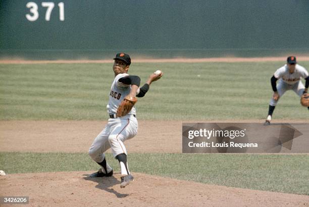 Juan Marichal of the San Francisco Giants pitches during a 1968 season game.