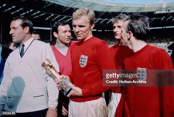 England captain Bobby Moore with the Jules Rimet trophy, following England's 4-2 victory after extra time over West Germany in the World Cup Final at...