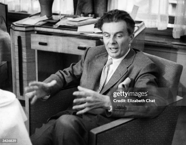 Aldous Huxley , British novelist and essayist, during an interview in London, during a visit to England after a 12 year absence. Original...