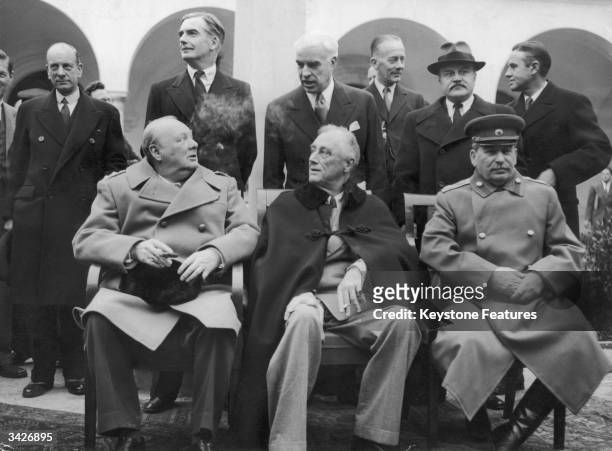 Winston Churchill, Franklin Delano Roosevelt and Joseph Stalin, seated from left to right, in the grounds of the Livadia Palace, Yalta, the US...