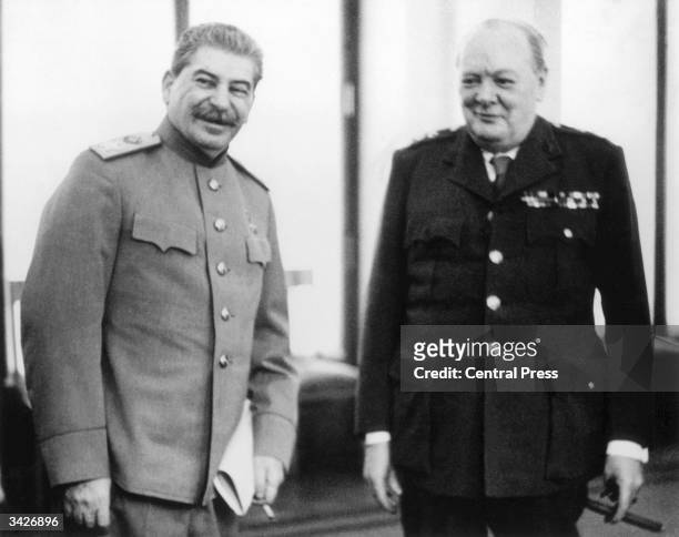 Marshal Joseph Stalin and Winston Churchill together at the Livedia Palace in Yalta, where they were both present for the conference.