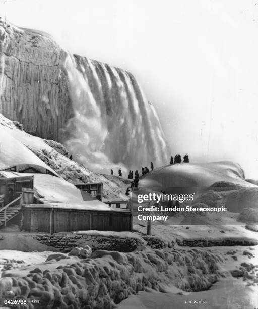 Niagara Falls with part of the falls frozen.