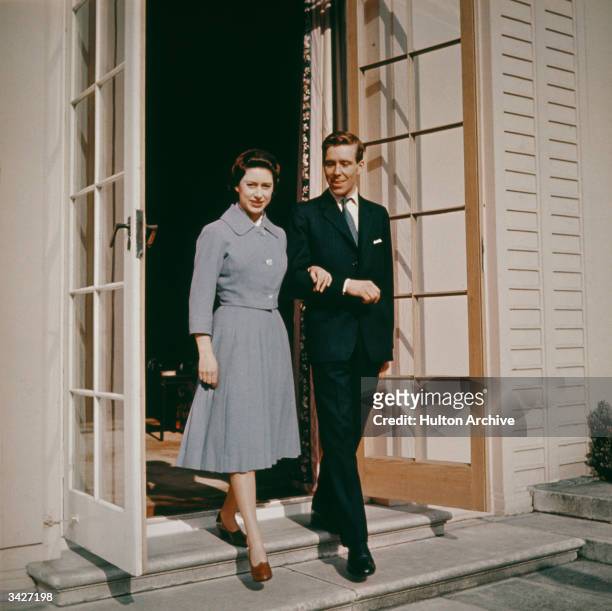 Princess Margaret Rose with her fiance Antony Armstrong-Jones at Royal Lodge, Windsor, on the day they announced their engagement.