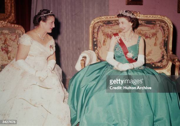Queen Elizabeth II with Germaine Coty, the wife of French President Rene Coty during her state visit to France.