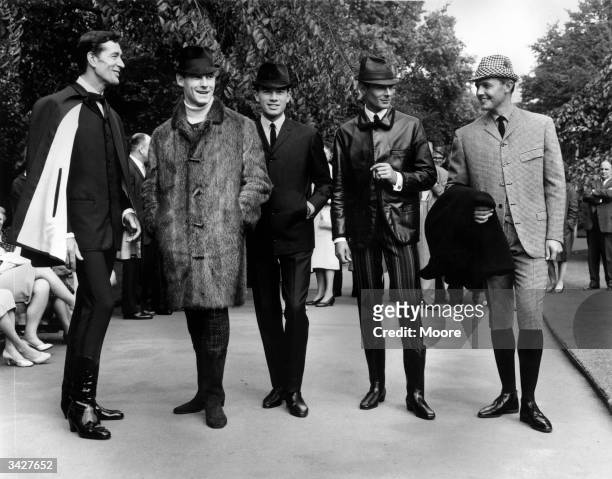 To celebrate their centenary, men's tailors Hepworths give a showing of fashions of the future designed by Hardy Amies. Left to right: Dick Orme...