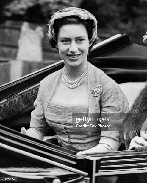 Princess Margaret is driven to the opening meeting of the Royal Ascot horse-racing event near Windsor in Berkshire.