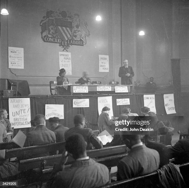 John McNair, General Secretary of the ILP addresses the Fifth Pan-African Congress, held at Chorlton-upon-Medlock Town Hall in Manchester, 15th -...