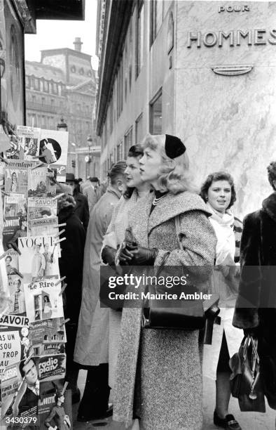 Roberta Cowell, formerly Robert Cowell visits Paris with a friend. Roberta was once a Spitfire pilot, prisoner-of-war, racing motorist, husband and...