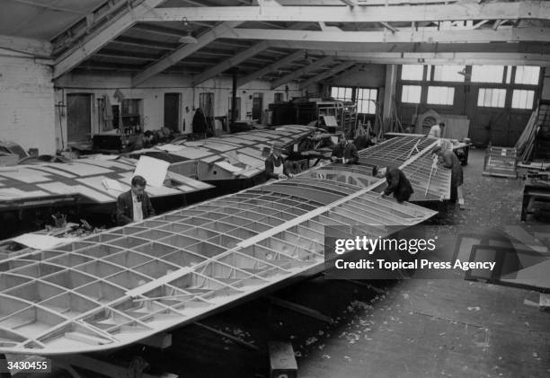 Making the wooden wing of a 'Spartan Cruiser' in a Saunders-Roe workshop. The plane is scheduled for the Heston-Isle of Wight air service.