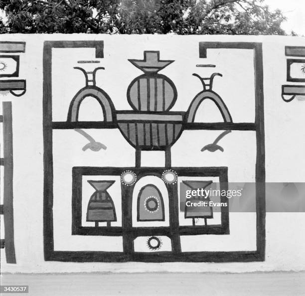Ndebele women decorate their houses and compound walls with intricate and geometric patterns. Traditional Ndebele dress and beadwork are also noted...
