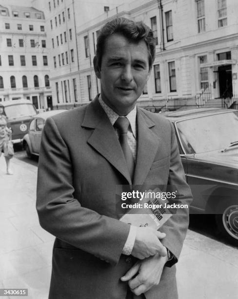 Brian Clough, the manager of Leeds United football club, arriving at the Football Association headquarters in London for a disciplinary hearing...