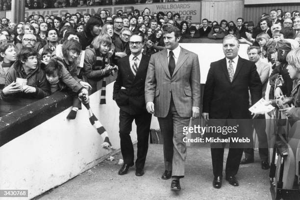 Former Manchester City manager Malcolm Allison meets the fans at Selhurst Park on his second day as manager of Crystal Palace. Accompanying him on...