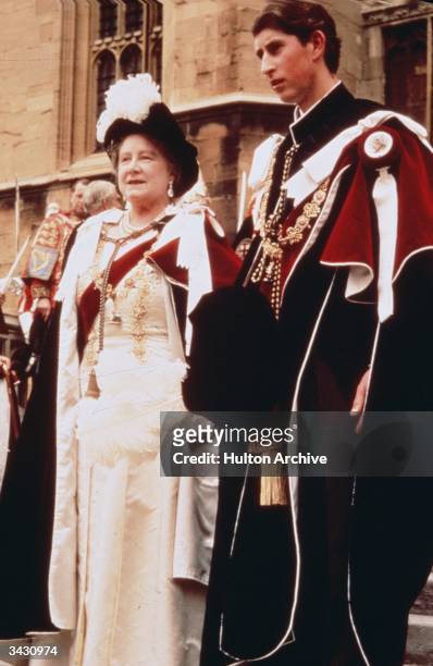 The Queen Mother leaves St George's Chapel, Windsor after a Garter Ceremony, accompanied by her grandson Prince Charles.