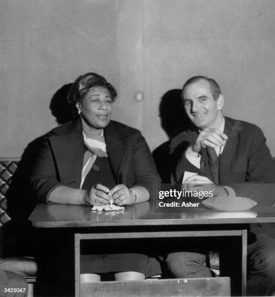 Jazz singer Ella Fitzgerald and tenor-sax player and jazz club owner, Ronnie Scott in London.