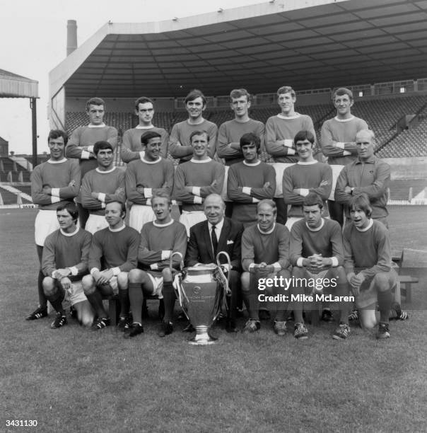 The Manchester United team at Old Trafford, Manchester, with the European Cup, Bill Foulkes, John Aston, Jimmy Rimmer, Alex Stepney, Alan Gowling and...
