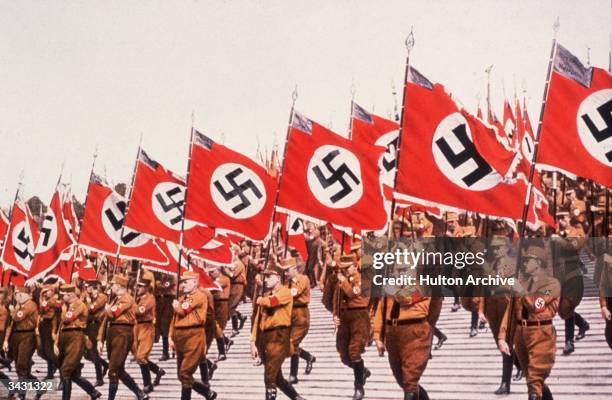 The entry of the colours, or Swastikas at the German National Socialist Party Day at Nuremberg.