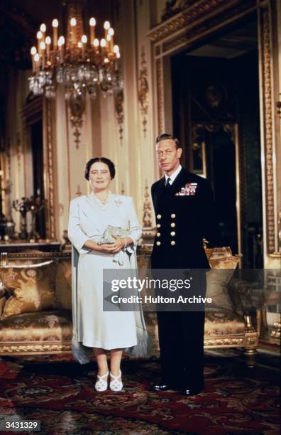 King George VI and Queen Elizabeth at Buckingham Palace, London.