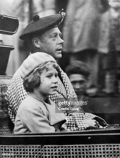 Edward VIII , with his niece Princess Elizabeth as they return from church during a visit to Balmoral.