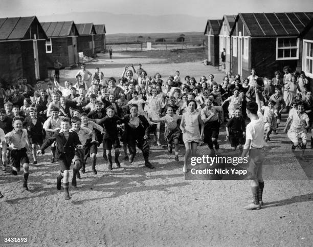 Schoolchildren from Lancashire in a holiday camp in North Wales during a holiday organised by the Swinton and Pendlebury Poor Children's Seaside Fund.