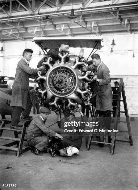 Mechanics at the Bristol Aeroplane Company works in Filton, Gloucester, adjusting a Bristol Jupiter engine during the manufacture of a Bristol...
