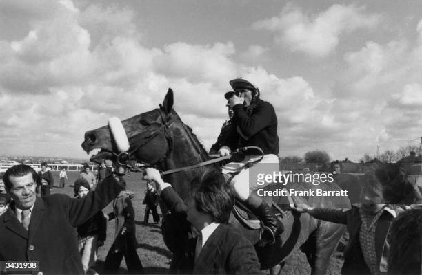 Red Rum being led in after his record breaking third Grand National win at Aintree racecourse in Liverpool.