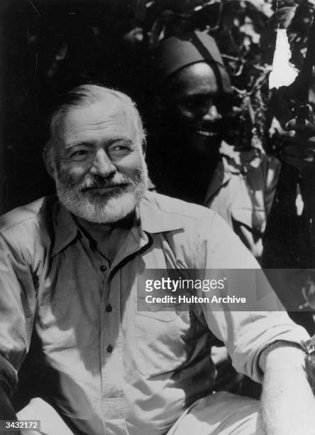 American novelist Ernest Hemingway on safari in Africa.
