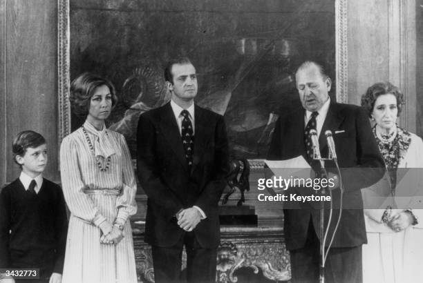 King Juan Carlos of Spain watches with Queen Sofia, Prince Felipe , and the Countess of Barcelona as his father, The Count Of Barcelona renounces any...