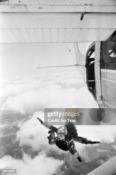 Year-old Edith Summers leaps out of the plane on her 100th skydive, high over the fields of Nottinghamshire. She is as yet unchallenged in her claim...