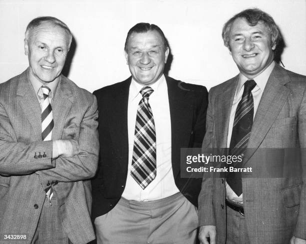 Liverpool Football Club manager Bob Paisley celebrates his fortieth year at the club with a luncheon at the Cafe Royal. With him are, former...