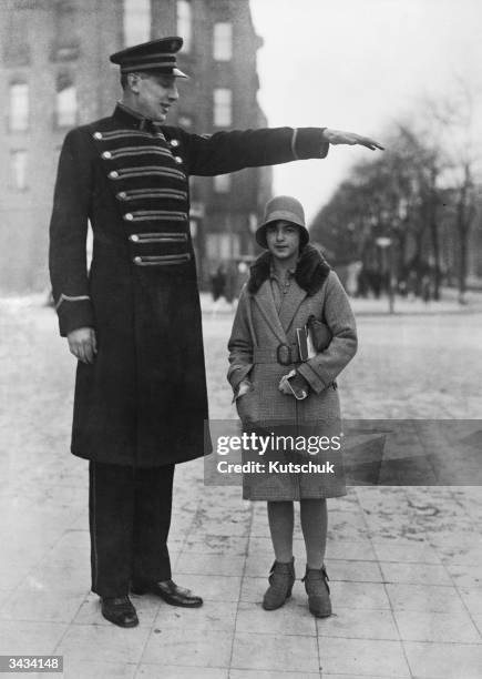 The tall man of Berlin Jacob Naken is a doorman at a West End cinema. His nickname is Uranus.