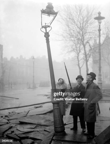 Comedian and actor Leslie Henson with Hollywood dancer, singer and film actor Fred Astaire and his sister Adele Astaire after an explosion at the...