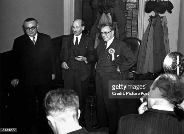 Ernest Bevin , Clement Attlee and Herbert Morrison meet supporters at Victory Hall, Leicester after their success in the first elections after World...