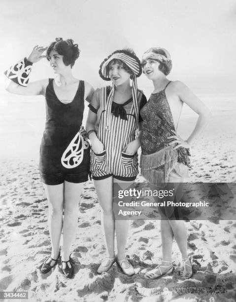 Three Mack Sennett girls or 'Bathing Beauties' on the beach.