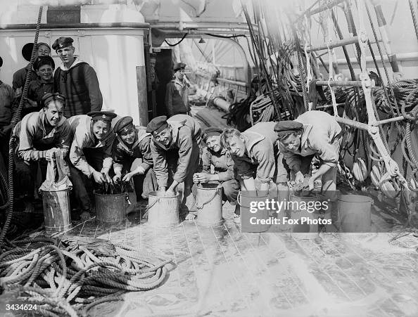 Sailors Scrubbing Down The Decks Of Their Yacht At Ryde On The Isle sailors-scrubbing-down-the-decks-of-their-yacht-at-ryde-on-the-isle