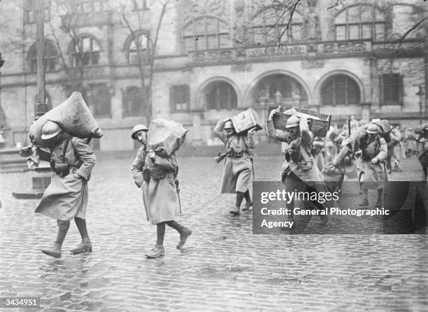 Group of French soldiers collecting provisions during the French occupation of Dusseldorf.